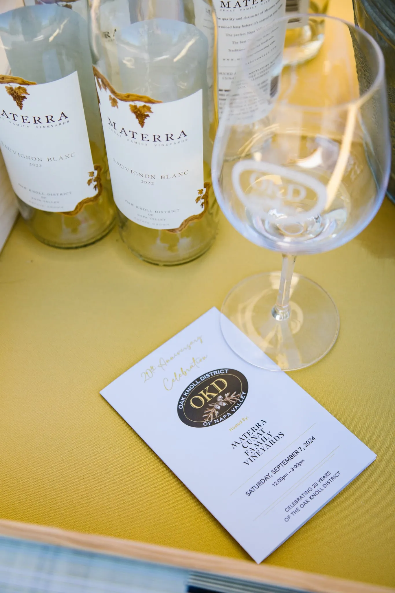 Materra Sauvignon Blanc bottles and poured wine glass at event
